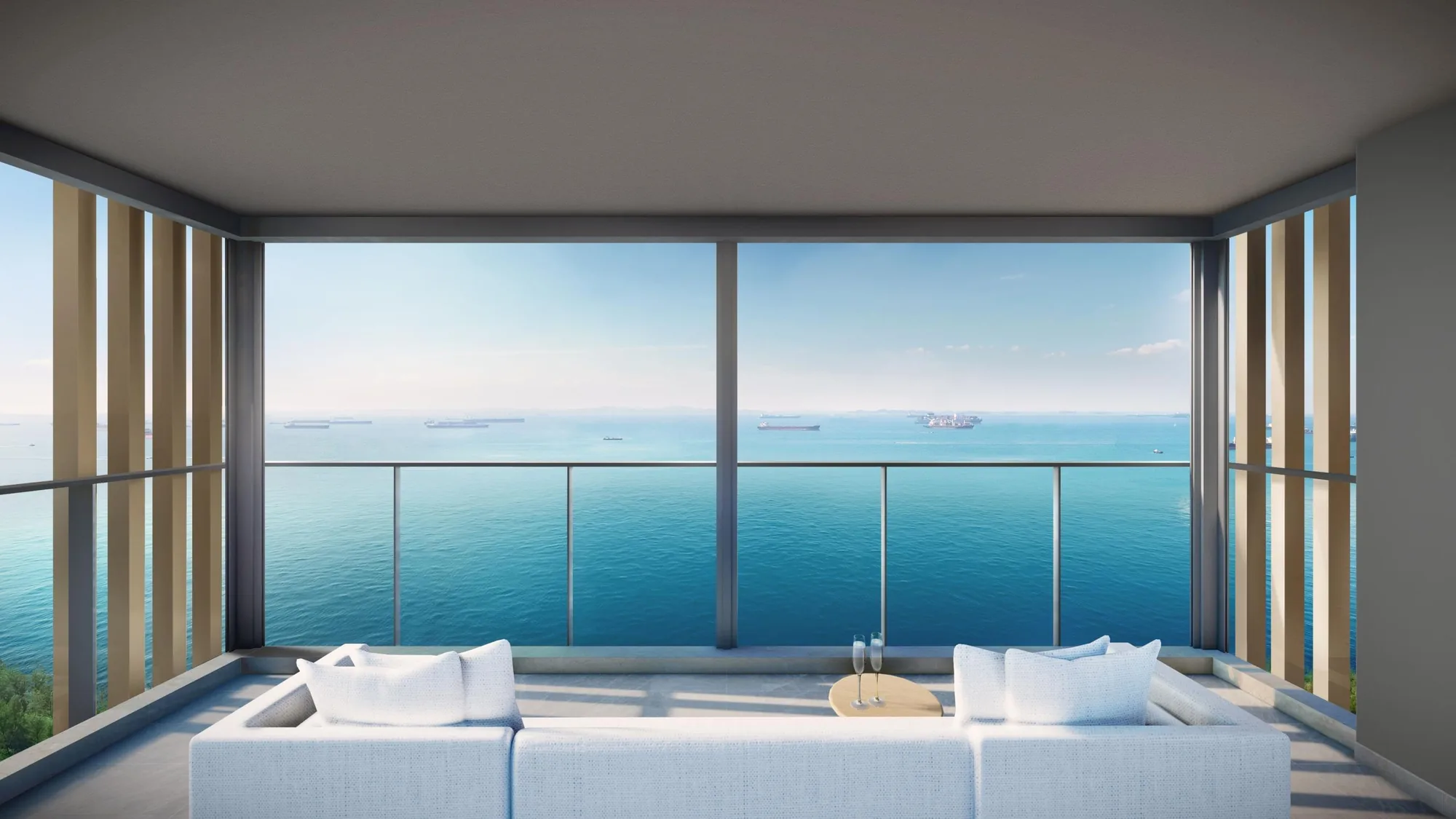Meyer Blue, artist&rsquo;s impression: a balcony with a low white sofa facing full-height glass and an open view of the sea, with ships at anchor on the horizon